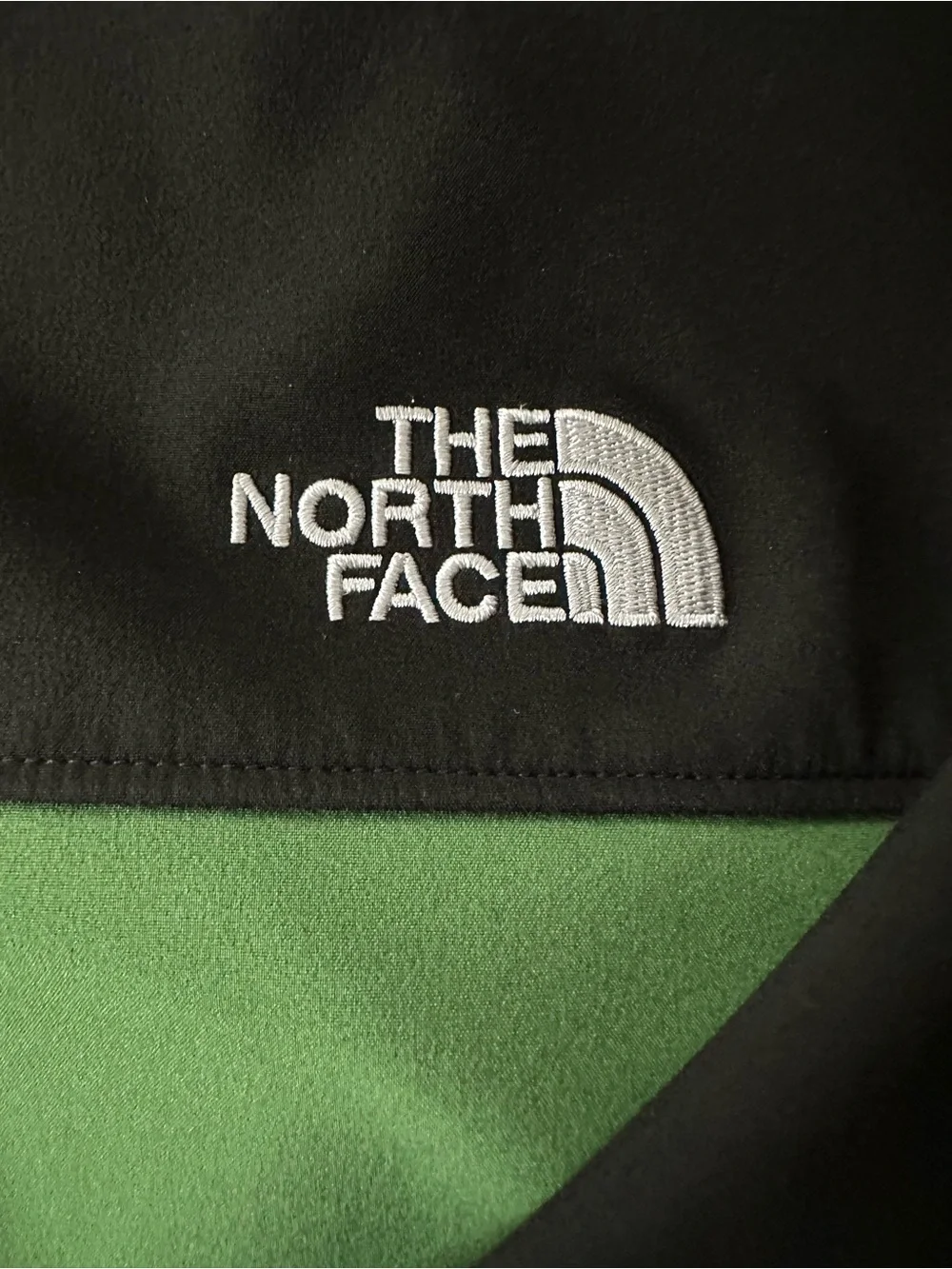 The North Face Green and Black Men’s Softshell Jacket